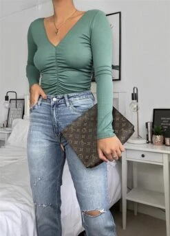 Light Denim Ripped High Waist Mom Jeans 5 Light Denim Ripped High Waist Mom Jeans -Miamis Style Shop light denim ripped high waist mom jeans hot miami styles 143104