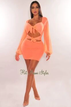 Neon Orange Mesh Tie Up Cut Out Long Sleeve Dress 10 Neon Orange Mesh Tie Up Cut Out Long Sleeve Dress -Miamis Style Shop neon orange mesh tie up cut out long sleeve dress hot miami styles 341009