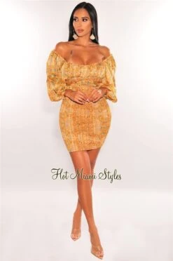 Orange Print Off Shoulder Long Sleeve Smocked Dress 6 Orange Print Off Shoulder Long Sleeve Smocked Dress -Miamis Style Shop orange print off shoulder long sleeve smocked dress hot miami styles 335594
