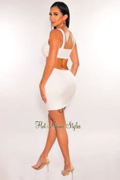 White Ribbed Sleeveless Knotted Cut Out Mini Dress 7 White Ribbed Sleeveless Knotted Cut Out Mini Dress -Miamis Style Shop white ribbed sleeveless knotted cut out mini dress hot miami styles 226234