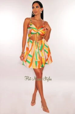 Yellow MultiColor Print Spaghetti Strap Ruched Cut Out Pleated Mini Dress 6 Yellow MultiColor Print Spaghetti Strap Ruched Cut Out Pleated Mini Dress -Miamis Style Shop yellow multicolor print spaghetti strap ruched cut out pleated mini dress hot miami styles 150592